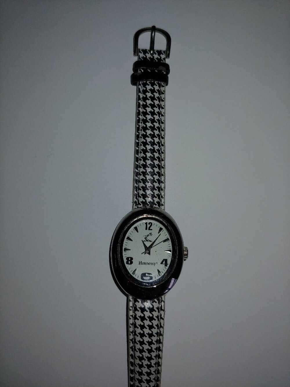 Hennessy, regular size 1 1/8'' wide approximately, womens classic wrist watch.